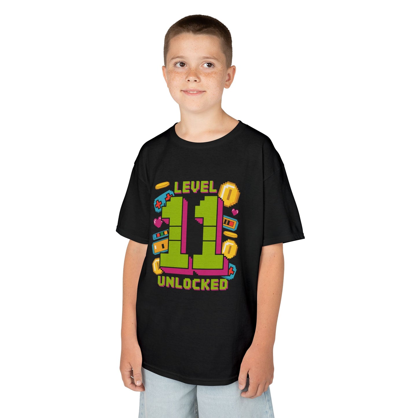 Child wearing a black t-shirt with colorful text design on a white background