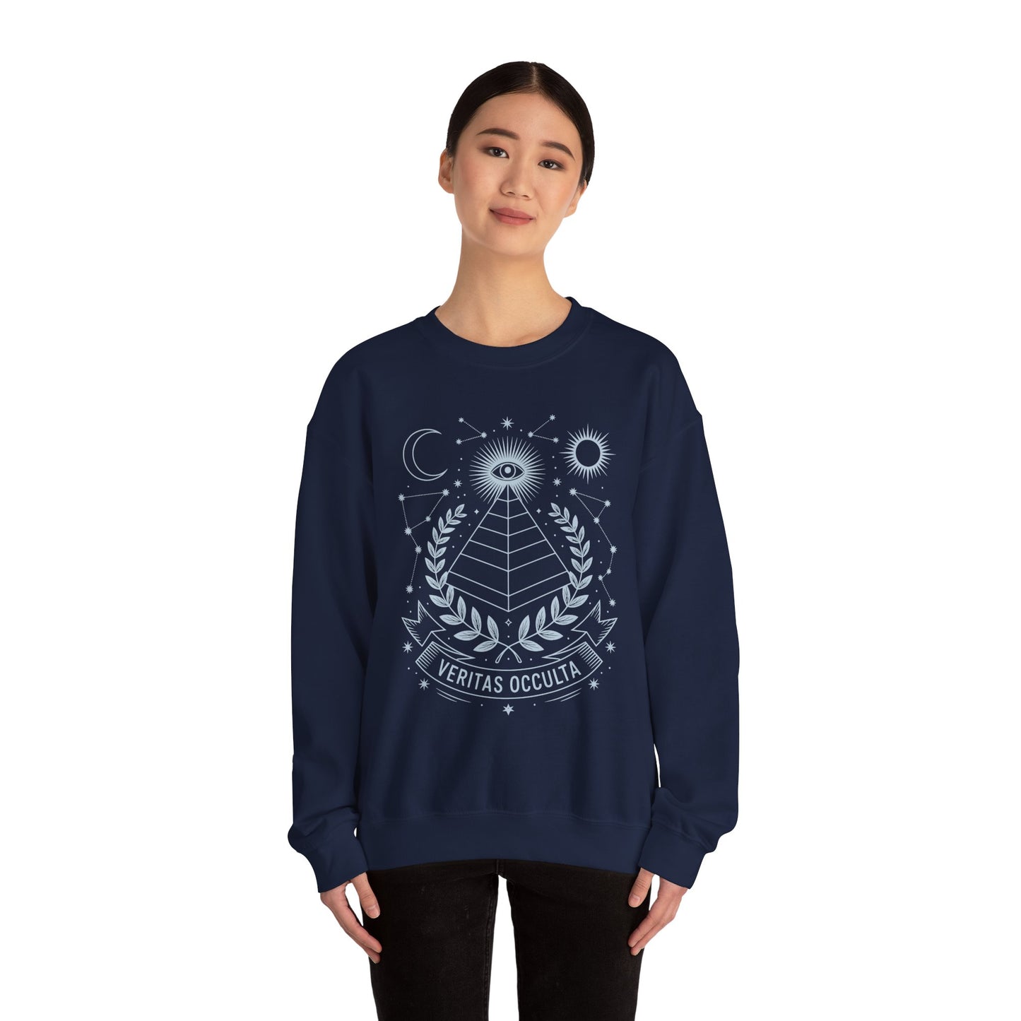 Esoteric graphic sweatshirt with celestial symbols and veritas occulta text Person wearing a navy blue sweatshirt with a pyramid and moon design on a white background
