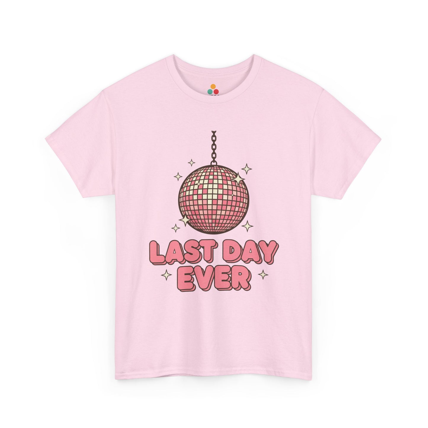Flat lay of light pink t-shirt wearing TEEZOCA Last Day Ever T-Shirt with disco ball illustration.