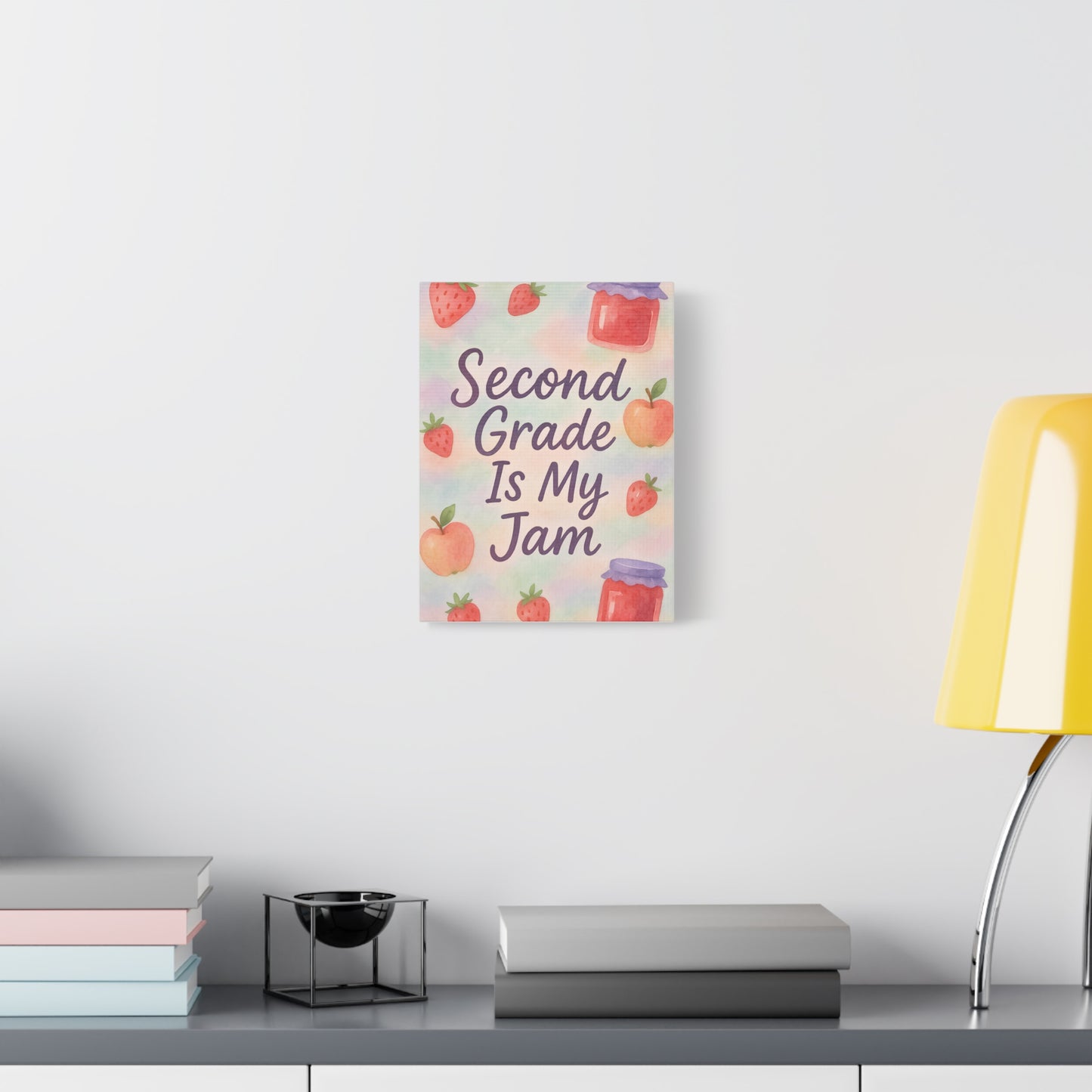 TEEZOCA “Second Grade Is My Jam” wall art in a clean white room with plant and console.