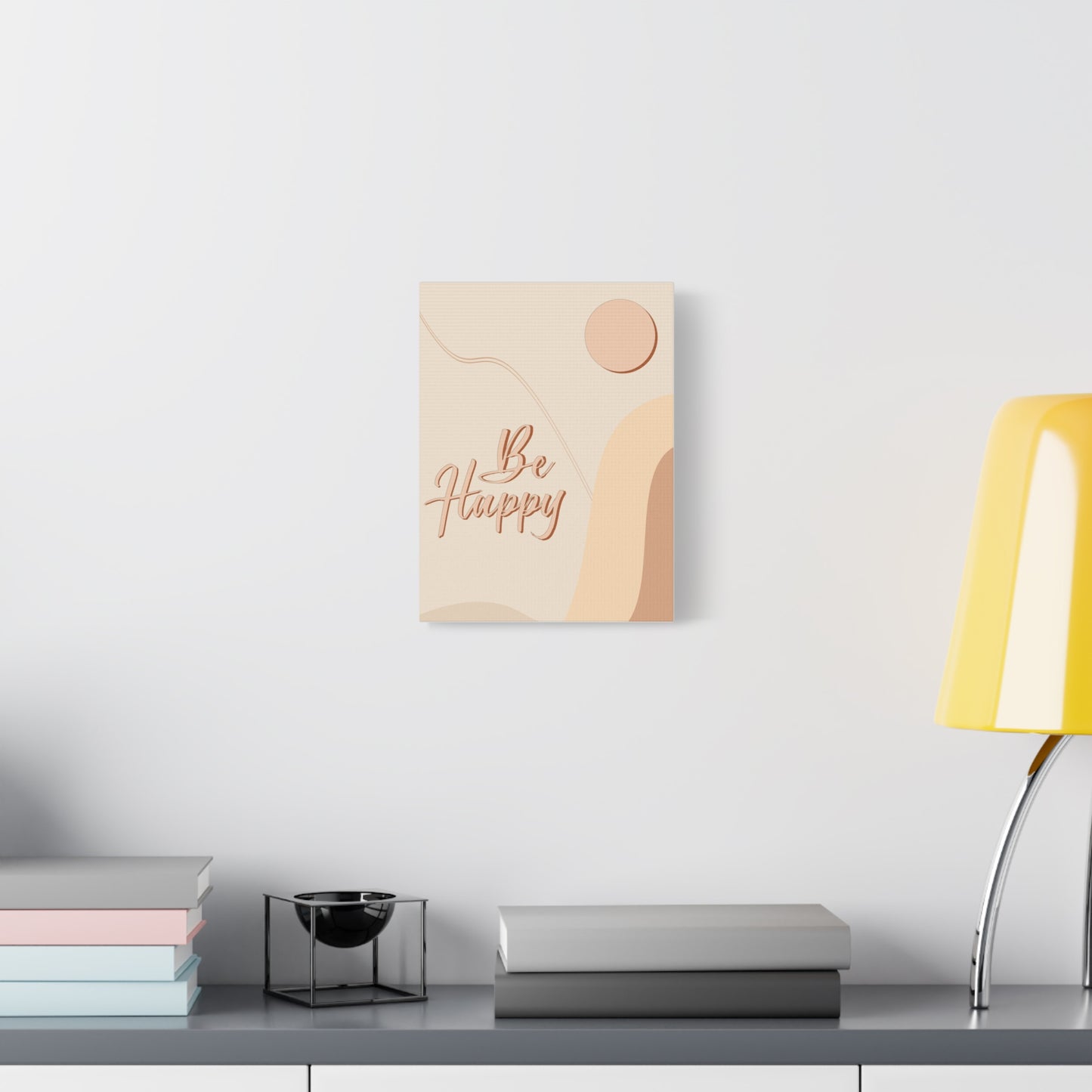 TEEZOCA minimalist "Be Happy" canvas displayed above a desk with plants.