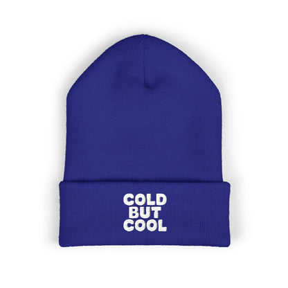 Blue beanie with 'Cold But Cool' text on a white background