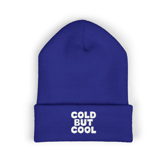 Blue beanie with 'Cold But Cool' text on a white background