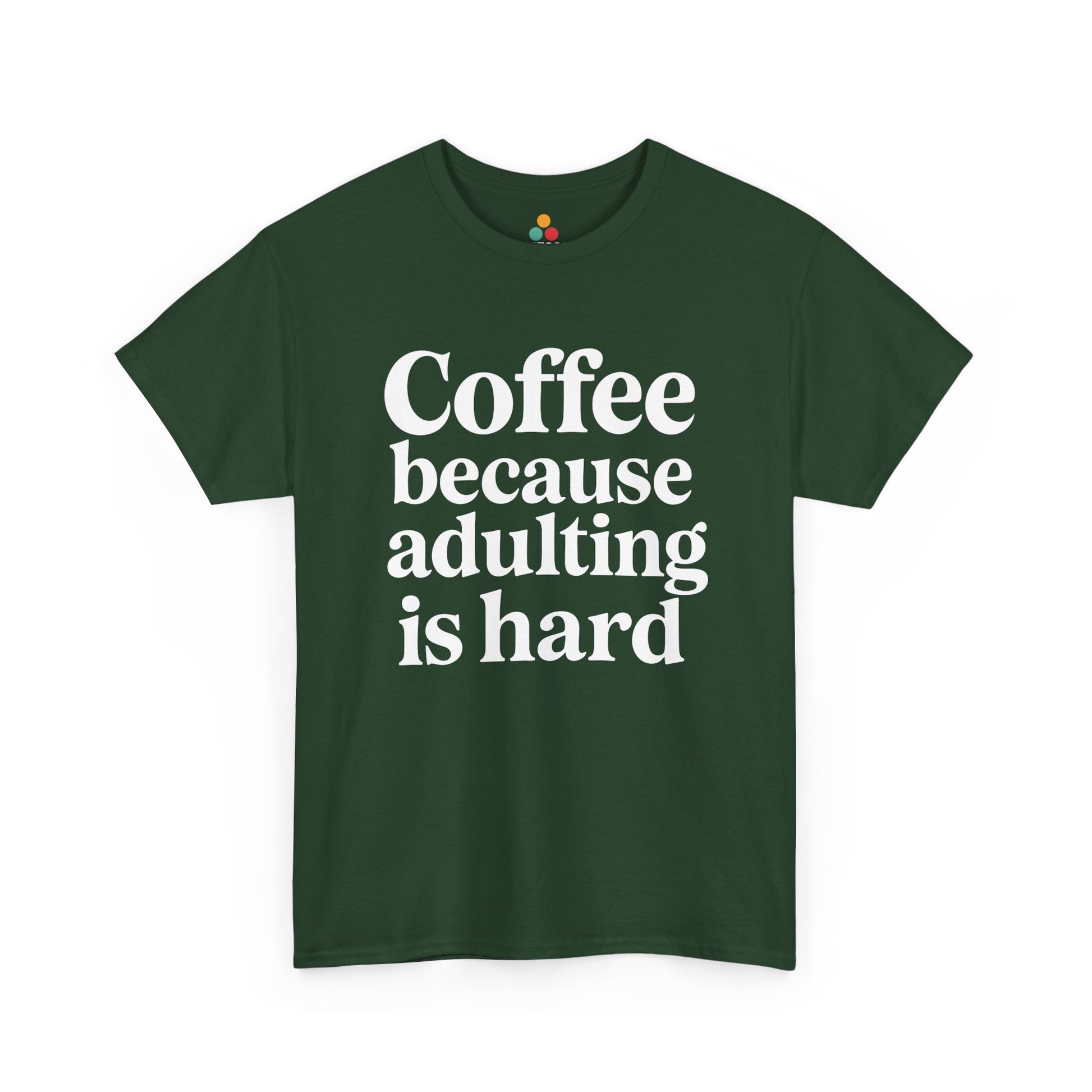 “Teezoca Coffee Because Adulting Is Hard shirt, funny adulting quote, light army green tee, flat lay.”

