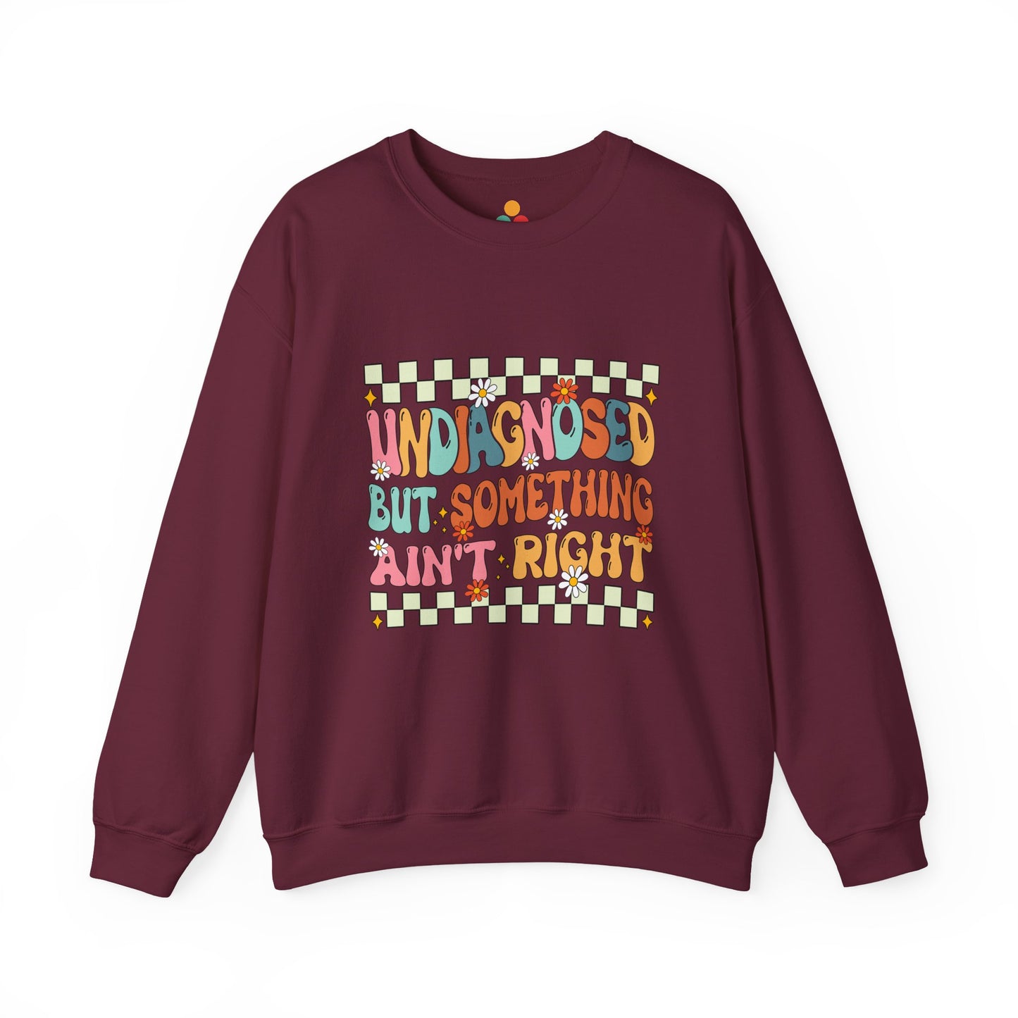 Maroon sweatshirt with colorful text and design on a white background