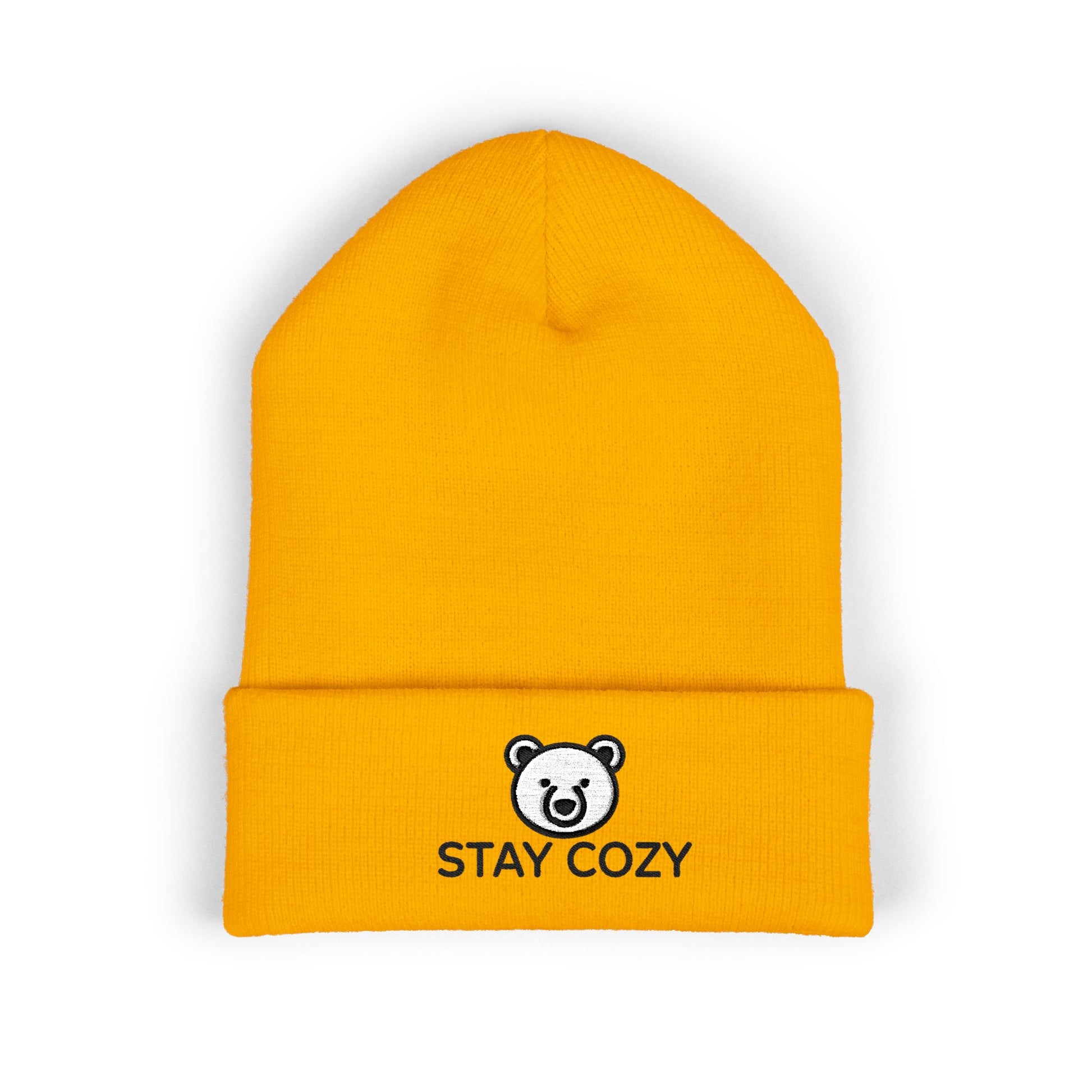 Yellow beanie with 'Stay Cozy' logo on a white background