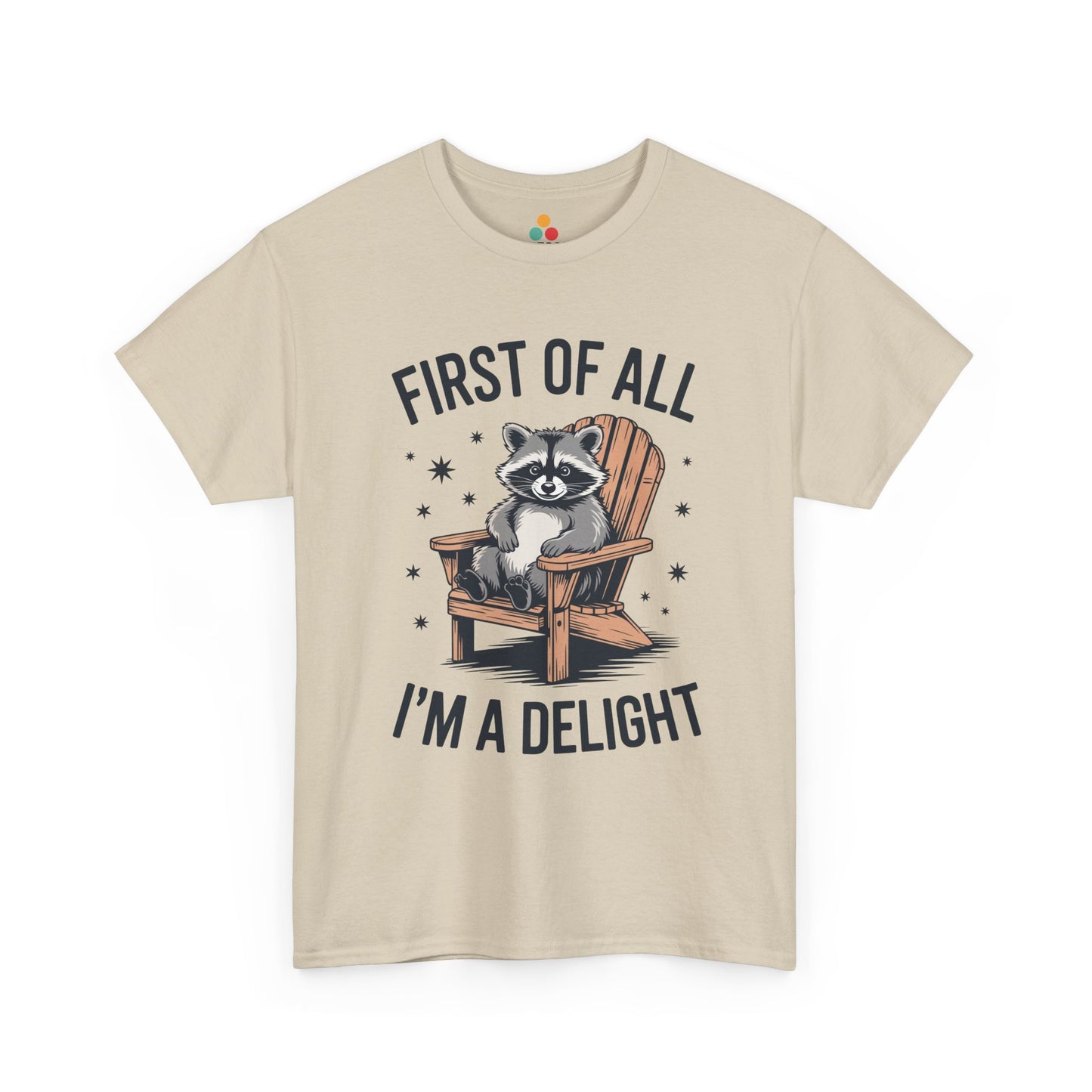 TEEZOCA beige “First Of All I’m A Delight” raccoon chair tee displayed flat.