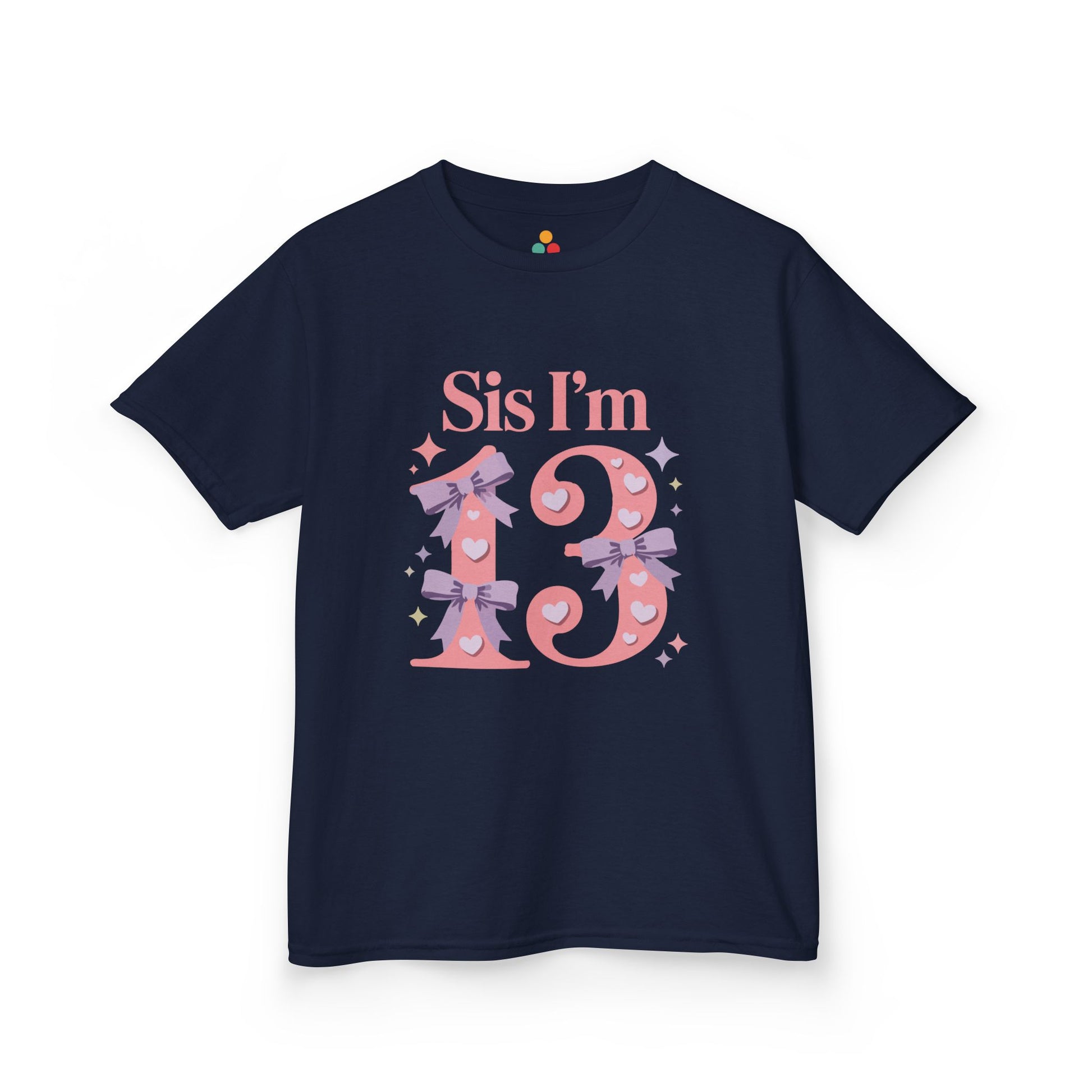  Navy t‑shirt with pink “Sis I’m 13” design featuring hearts, lilac bows, and sparkles, flat front view.