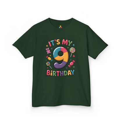 “Forest green ‘It’s My 9th Birthday’ candy shirt, big rainbow 9 and lollipops, flat front.”


