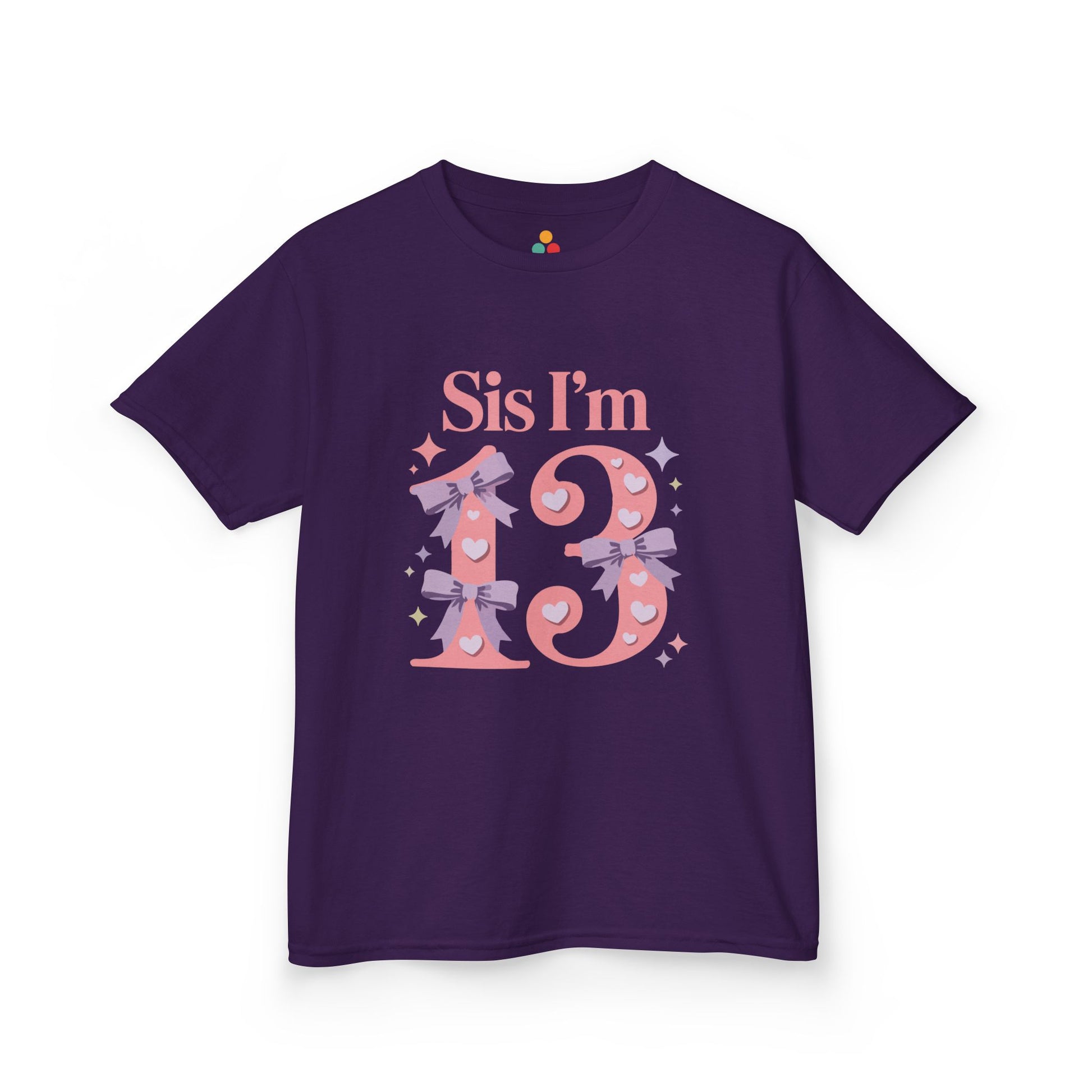  Purple t‑shirt with pink “Sis I’m 13” design featuring hearts, lilac bows, and sparkles, flat front view.