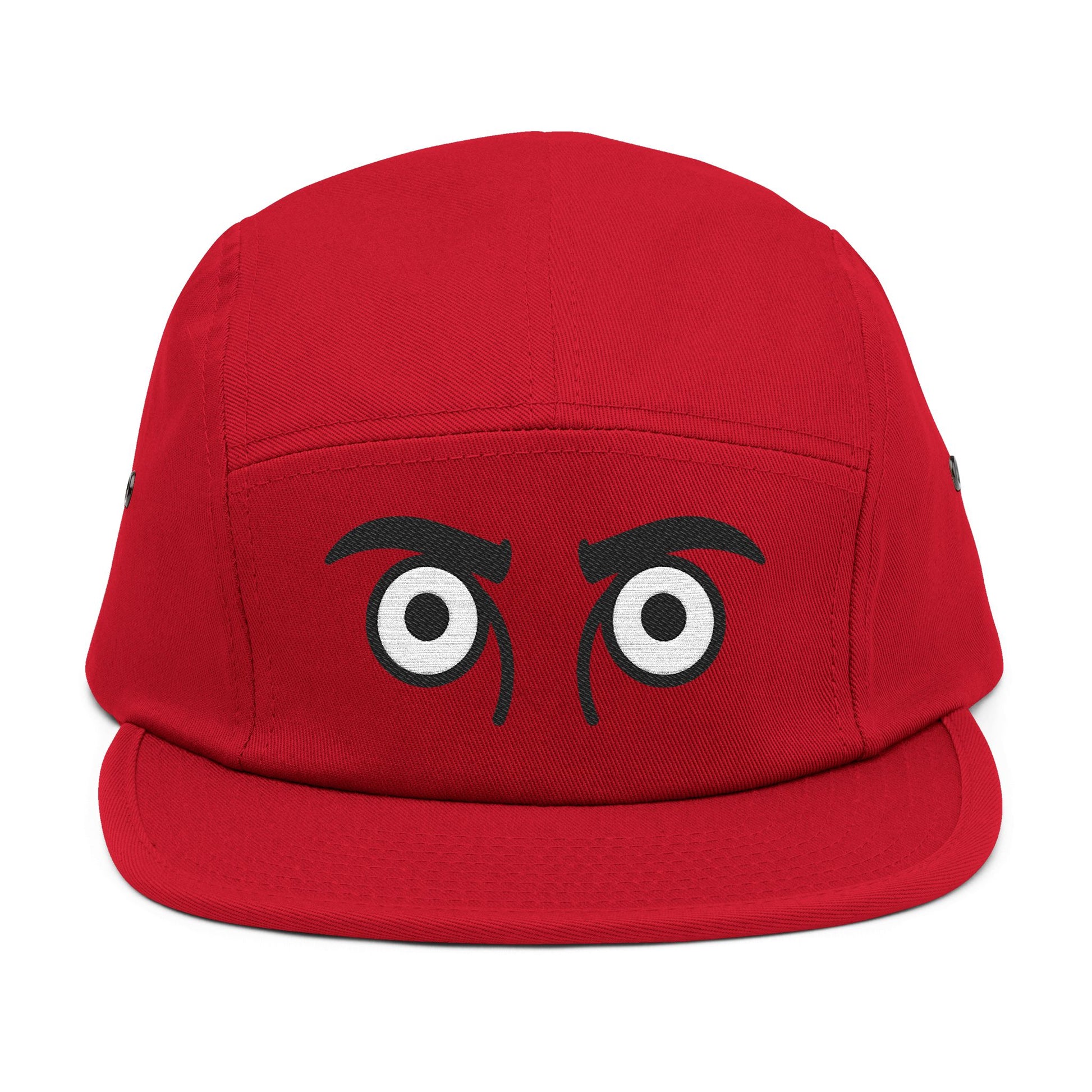 Red cap with cartoonish eyes on a white background. TEEZOCA