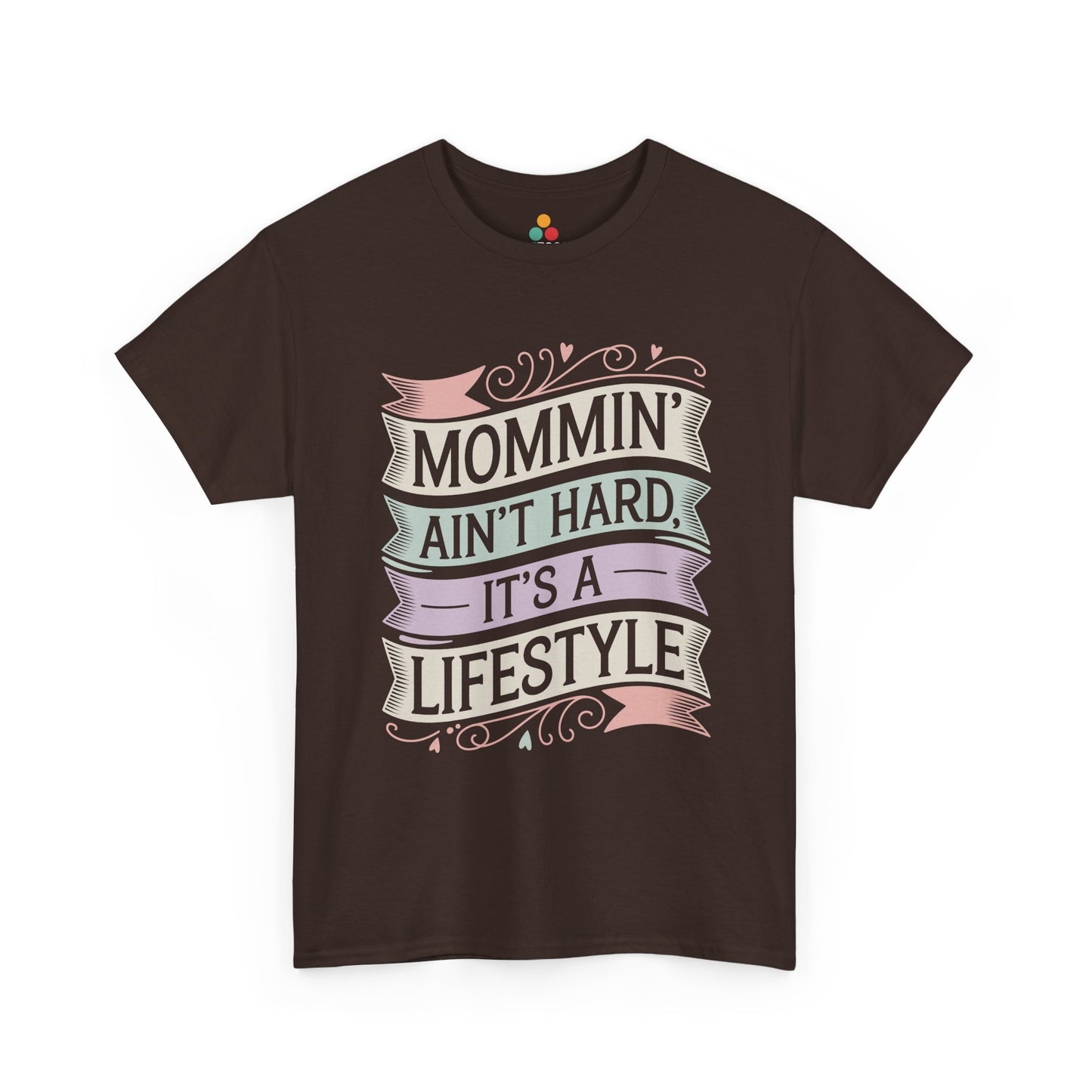 TEEZOCA brown “Mommin’ Ain’t Hard, It’s A Lifestyle” pastel ribbon graphic tee displayed flat.