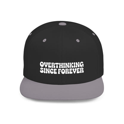 Black cap with 'OVERTHINKING SINCE FOREVER' text on a white background