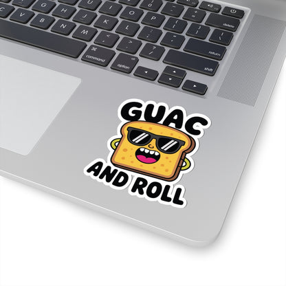 Laptop with a sticker of a cartoon guacamole container wearing sunglasses and text 'GUAC AND ROLL' on a white background. TEEZOCA