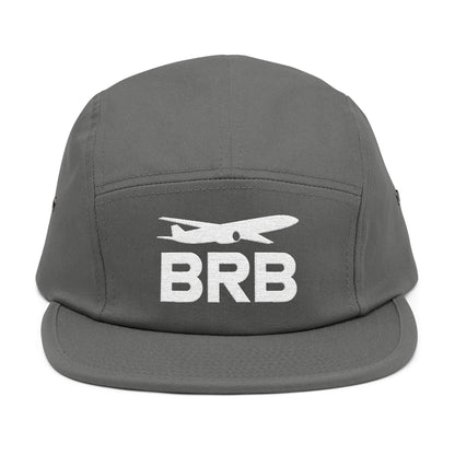 Gray cap with 'BRB' and airplane icon on a white background. Minimalist BRB airplane embroidered design for 5-panel cap by TEEZOCA