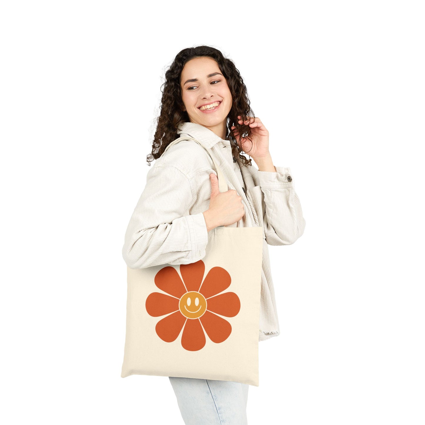 Vintage-style smiley flower artwork on a TEEZOCA tote bag