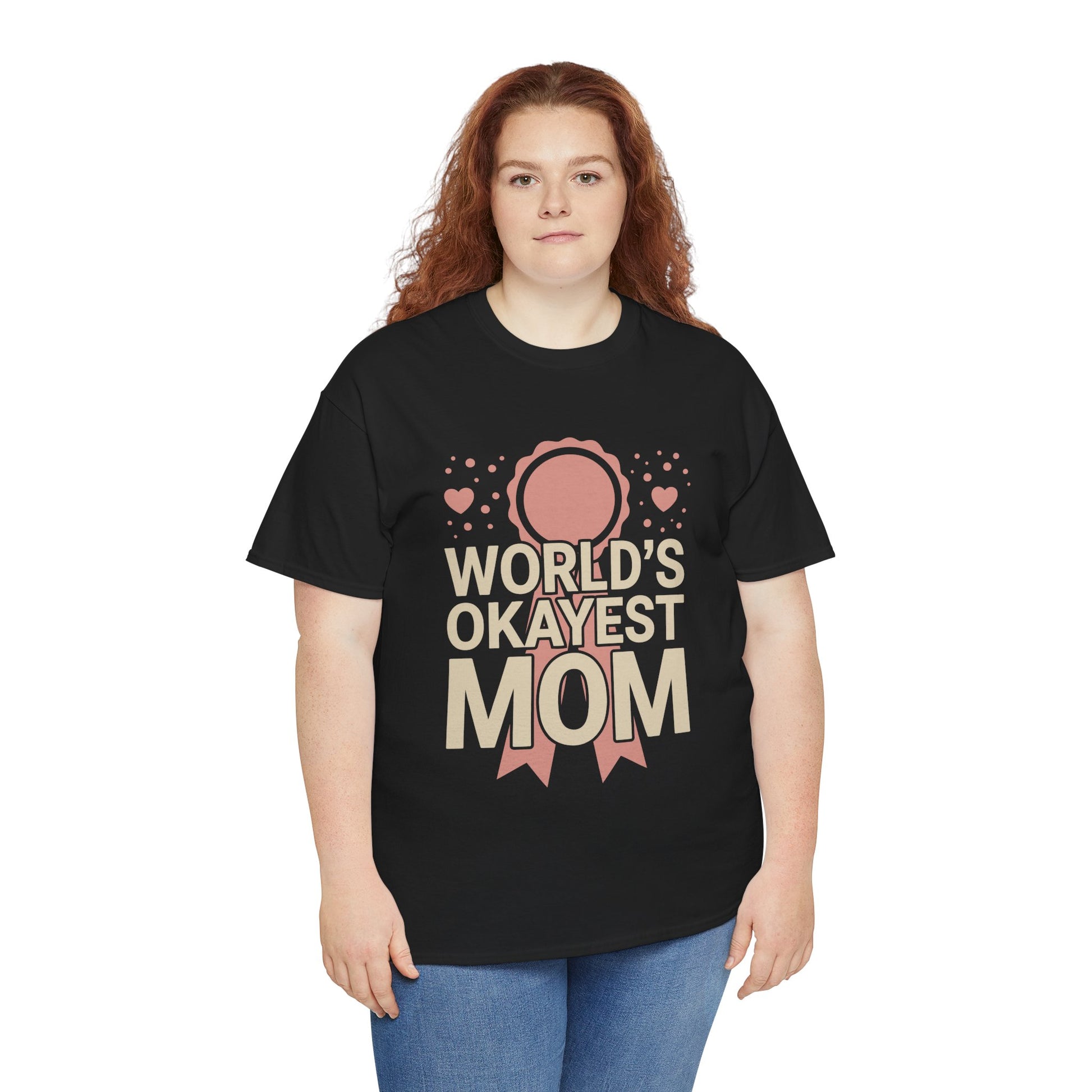 Woman wearing a black TEEZOCA "World's Okayest Mom" funny mom tee with jeans.