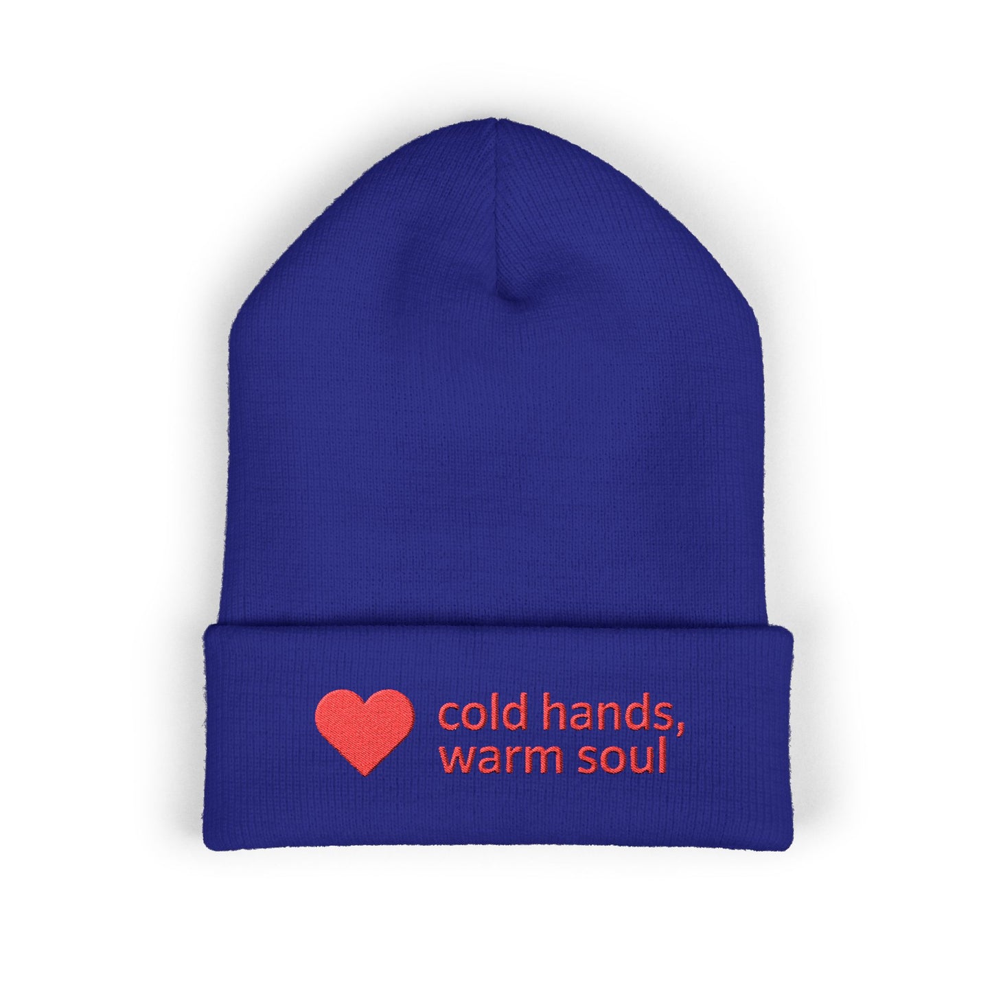 Blue beanie with red heart and text 'cold hands, warm soul' on a white background