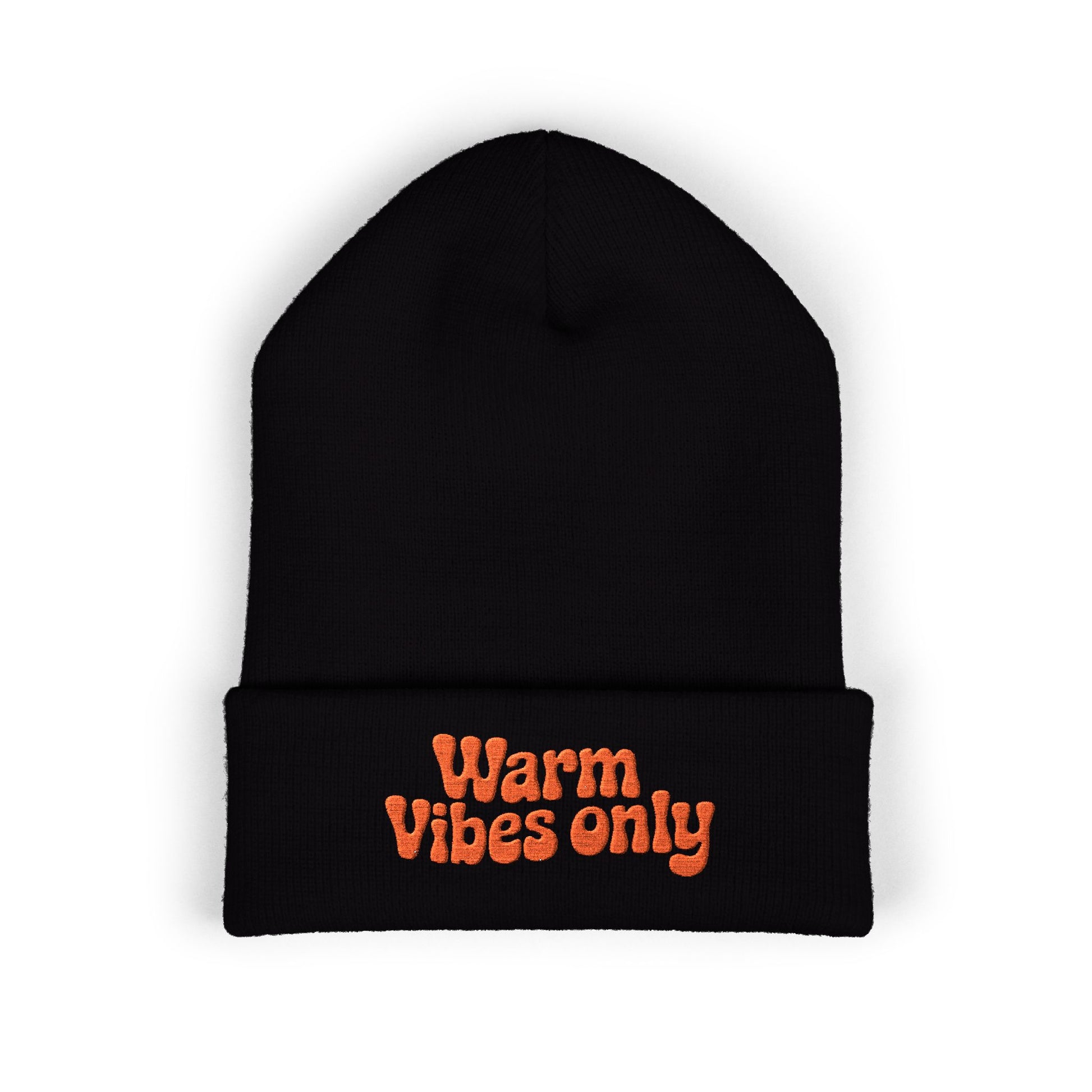 Black beanie with 'Warm Vibes only' text in orange on a white background. “Warm vibes only” embroidered patch on cozy cuffed beanie in retro orange thread.