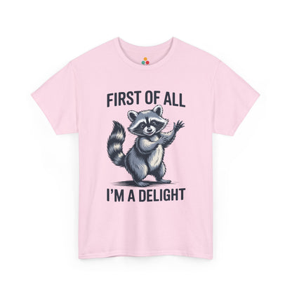 TEEZOCA pink “First Of All I’m A Delight” cute raccoon graphic tee shown flat.