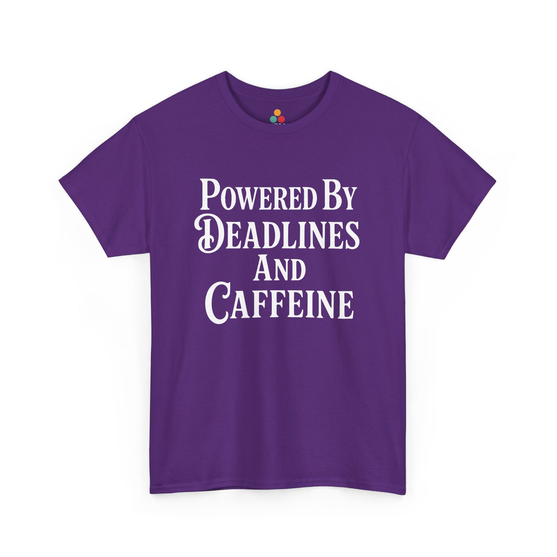 "Purple unisex t‑shirt with bold white 'Powered By Deadlines and Caffeine' text design, flat front."


