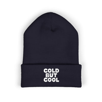 Navy beanie with 'Cold But Cool' text on a white background