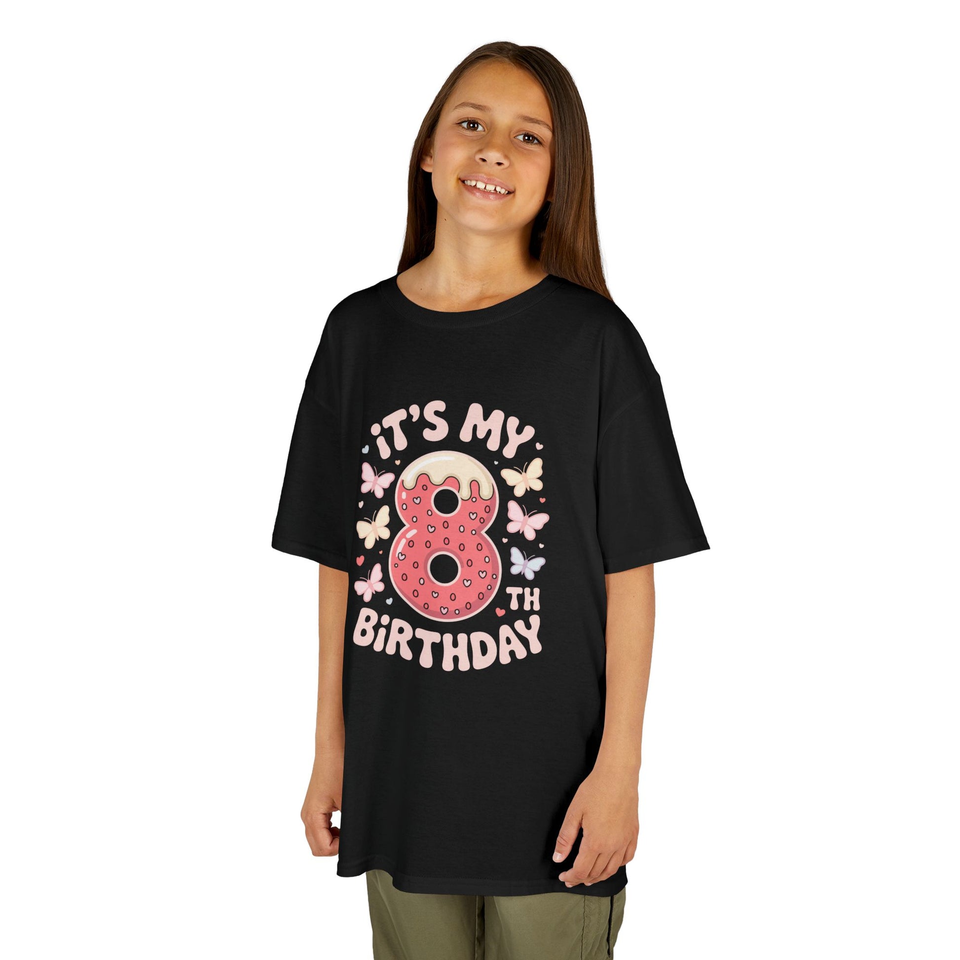 “Girl wearing black ‘It’s My 8th Birthday’ donut and butterflies shirt, cute 8th birthday tee, front view.”

