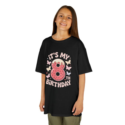 “Girl wearing black ‘It’s My 8th Birthday’ donut and butterflies shirt, cute 8th birthday tee, front view.”

