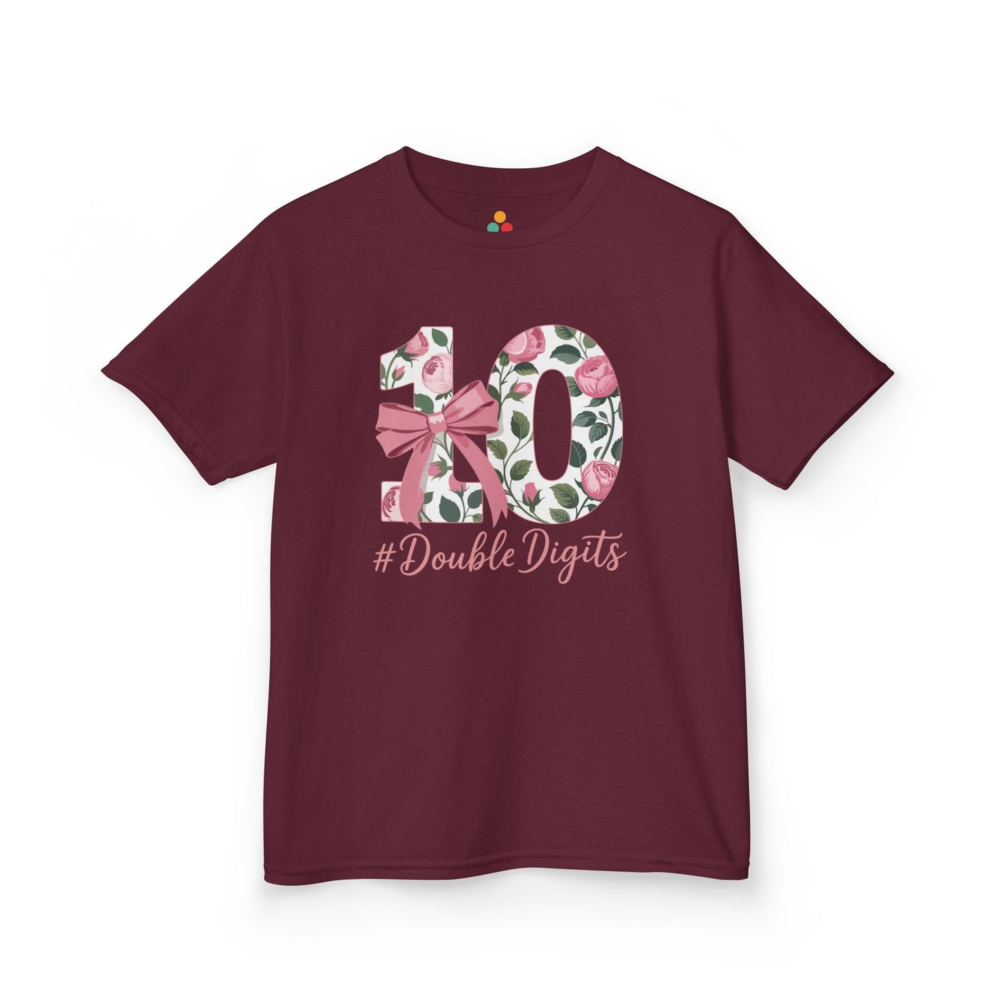“Maroon t‑shirt featuring floral number 10 with pink roses and bow, ‘#DoubleDigits’ text, girls 10th birthday top, flat display.”

