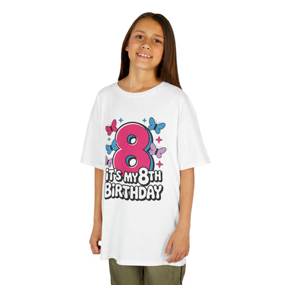 “Girl wearing white ‘It’s My 8th Birthday’ pink 8 and butterflies shirt, front view.”

