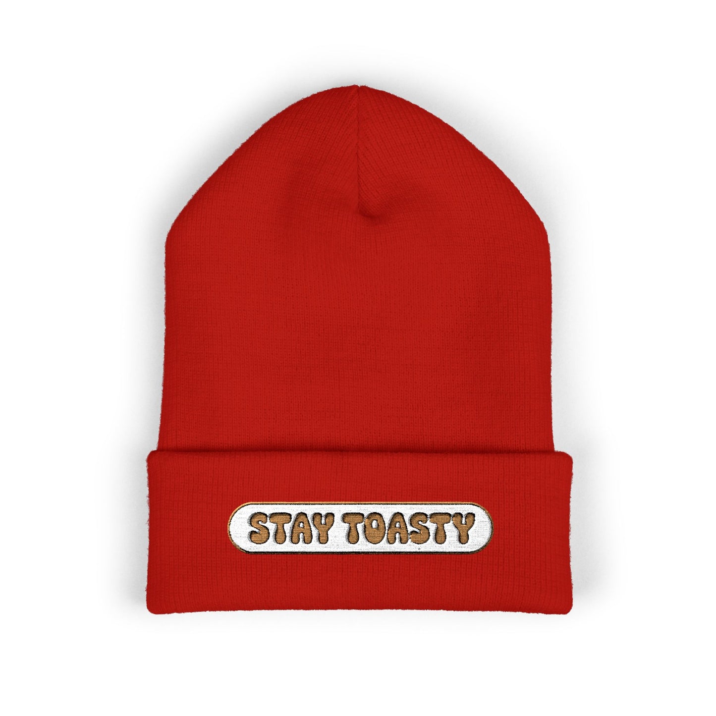 Red beanie with 'Stay Toasty' label on a white background