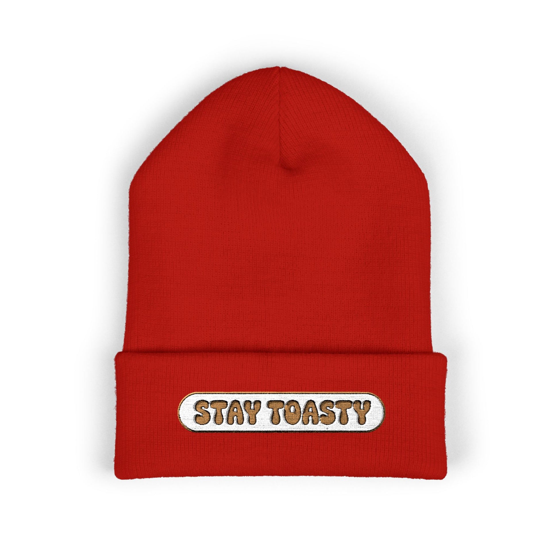Red beanie with 'Stay Toasty' label on a white background