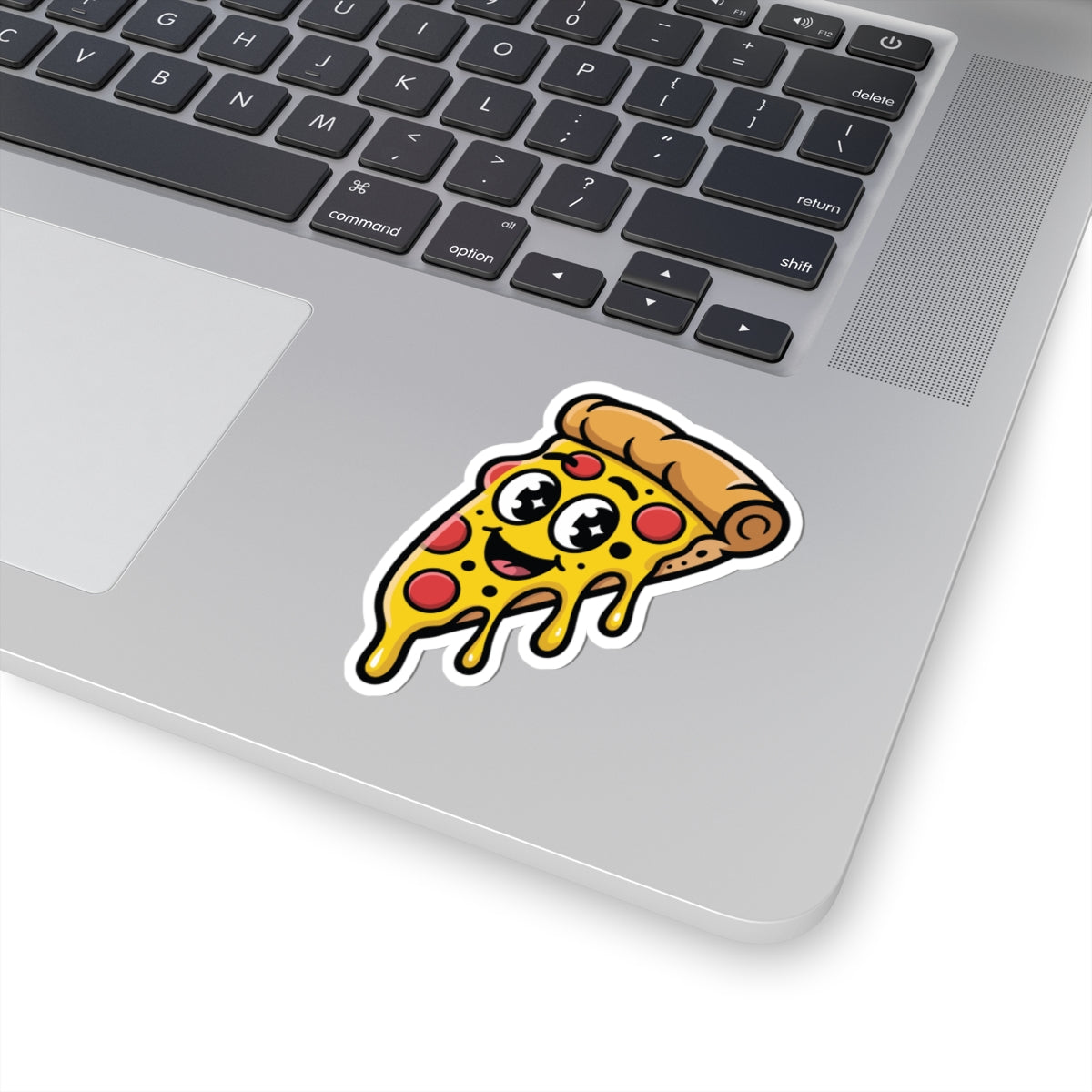 Laptop with a cartoon pizza slice sticker on the palm rest area. TEEZOCA