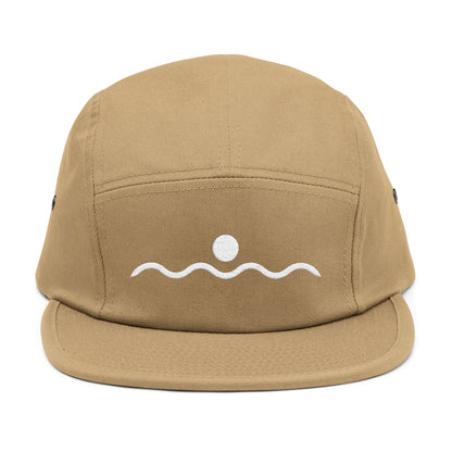 Tan cap with a white wave and sun design on a white background. Minimal sunset and wave line-art graphic in white. TEEZOCA