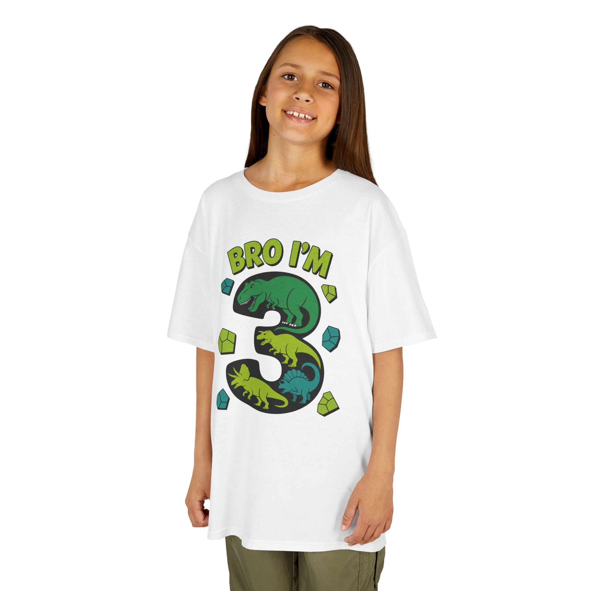 "Child wearing white 'Bro I'm 3' dinosaur birthday t‑shirt with big number 3 and dinos, front view."

