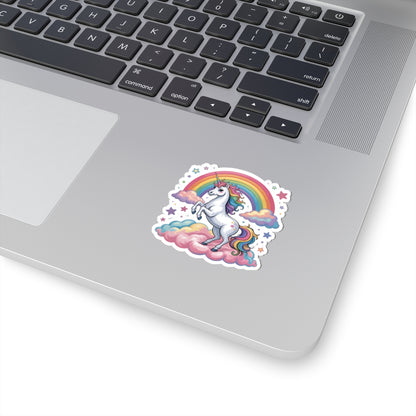 Laptop with a colorful unicorn sticker featuring a rainbow on a white background. TEEZOCA