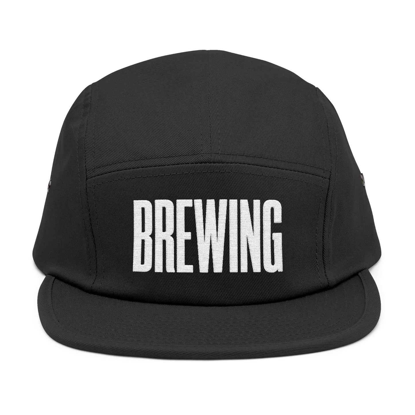 Black cap with 'BREWING' text on a white background. BREWING minimalist text embroidery design on 5-panel cap. TEEZOCA