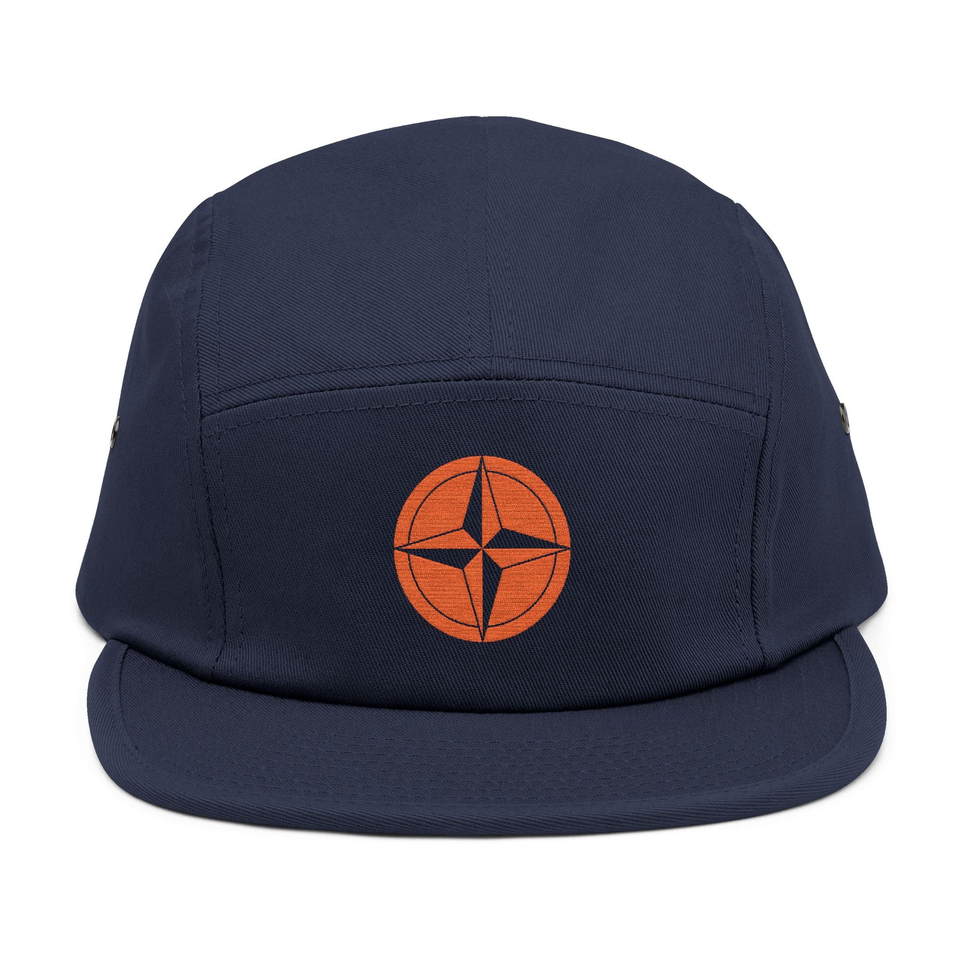 Navy blue cap with an orange circular logo on a white background. minimalist compass star icon embroidered design for 5-panel cap by TEEZOCA