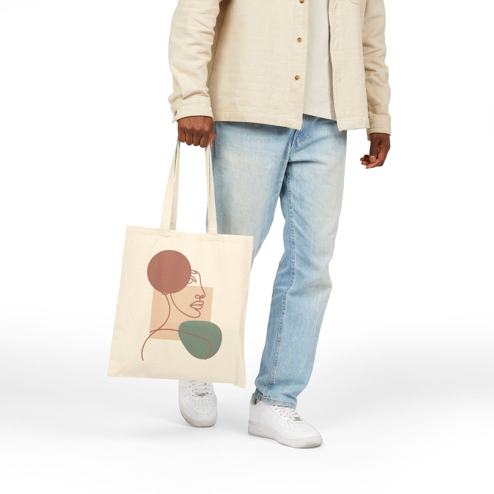 Minimalist abstract face illustration artwork printed on a TEEZOCA tote bag