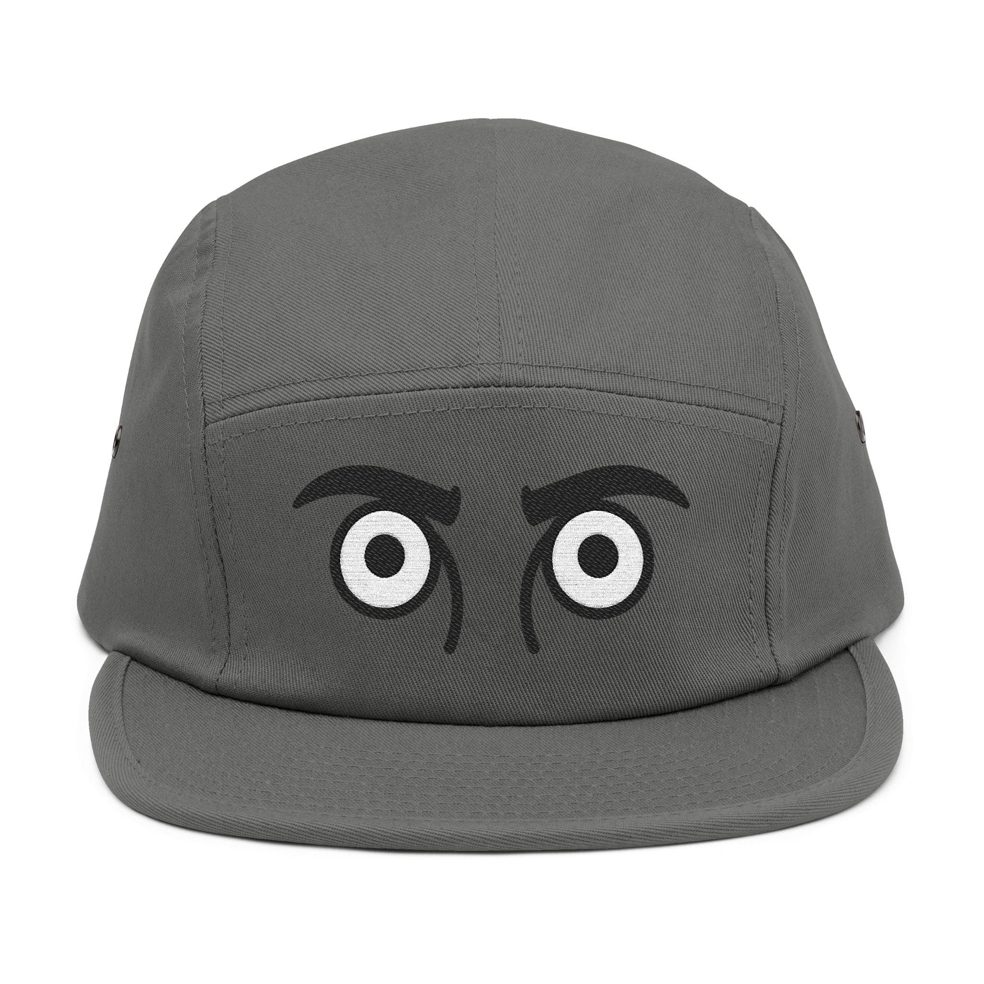 Gray cap with cartoon eyes on a white background. TEEZOCA