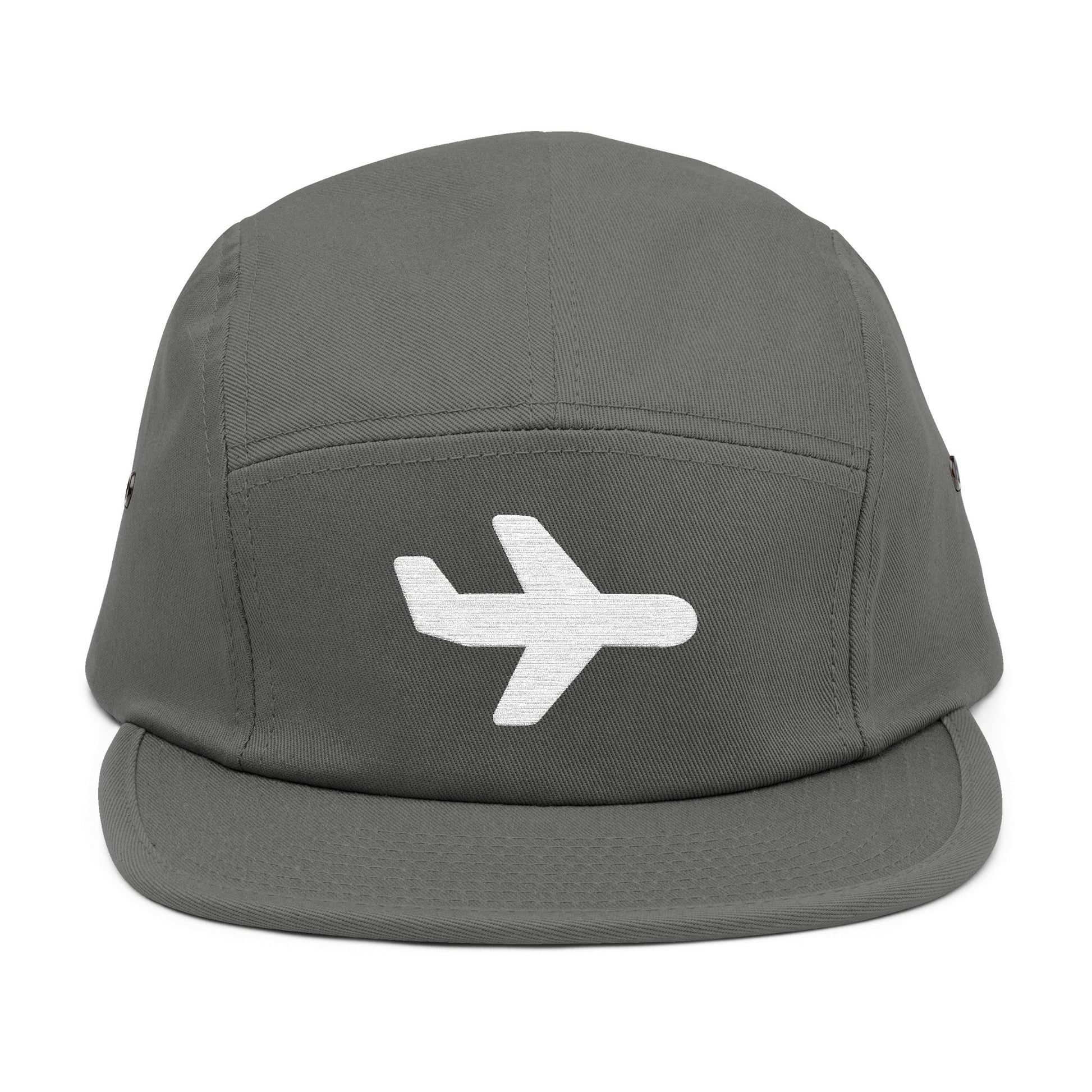 Gray cap with a white airplane icon on a white background. Minimal white airplane icon embroidered on black 5-panel cap. TEEZOCA
