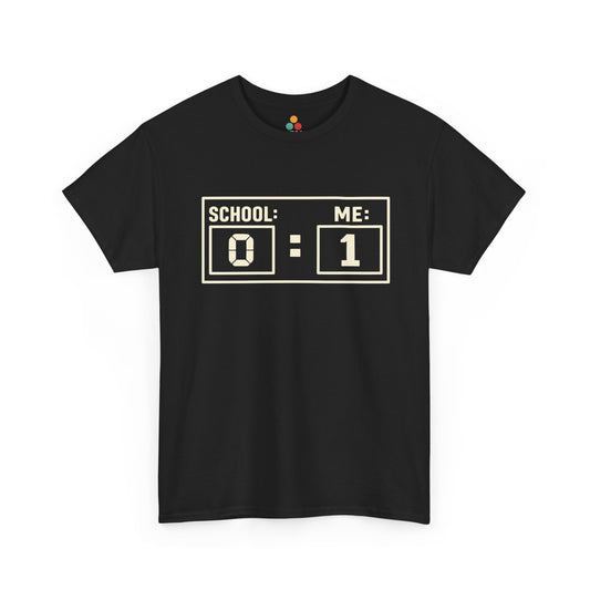 Black TEEZOCA t‑shirt with “SCHOOL: 0 ME: 1” scoreboard design shown flat.