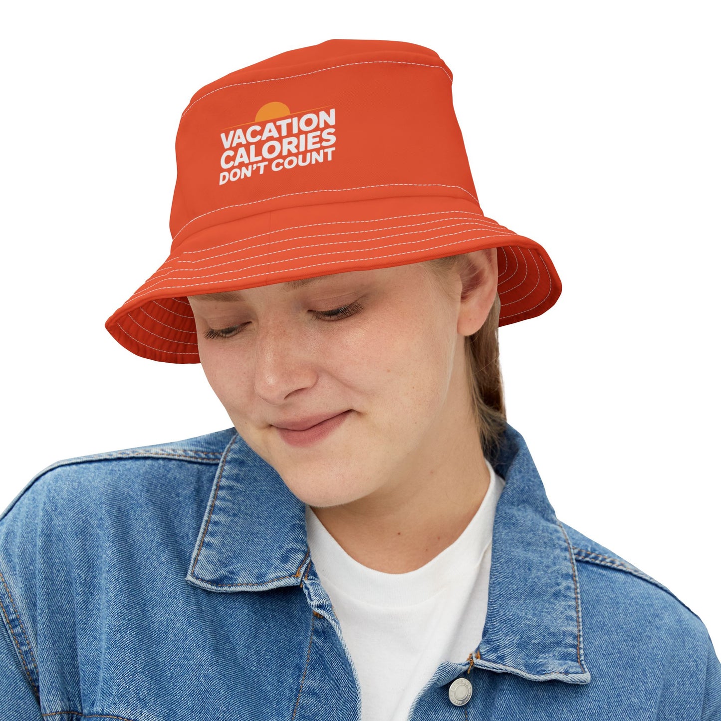Funny range bucket hat with 'Vacation Calories Don't Count' text on a white background. TEEZOCA