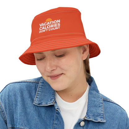 Funny range bucket hat with 'Vacation Calories Don't Count' text on a white background. TEEZOCA