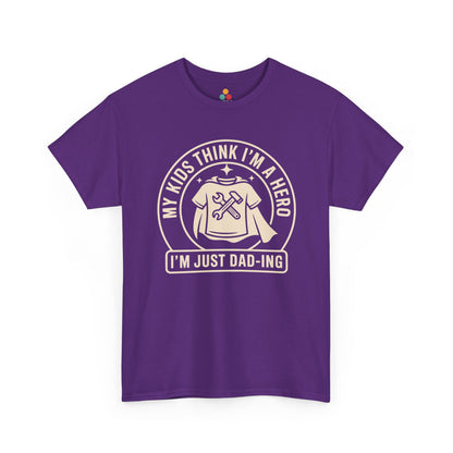 TEEZOCA purple “My Kids Think I’m A Hero I’m Just Dad‑ing” funny graphic tee shown flat.