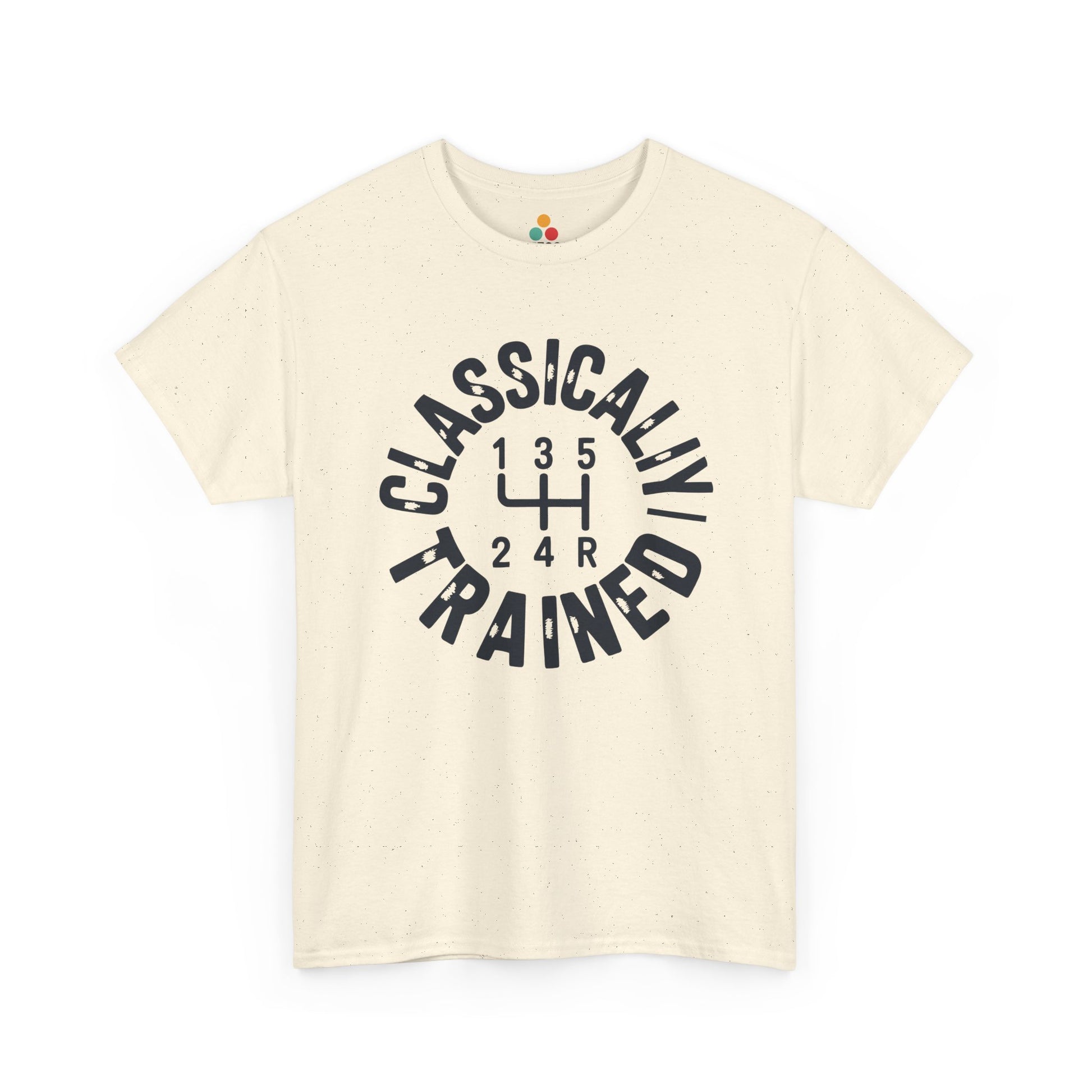 Light yellow t‑shirt with bold dark “Classically Trained” stick‑shift artwork, flat front view.​
