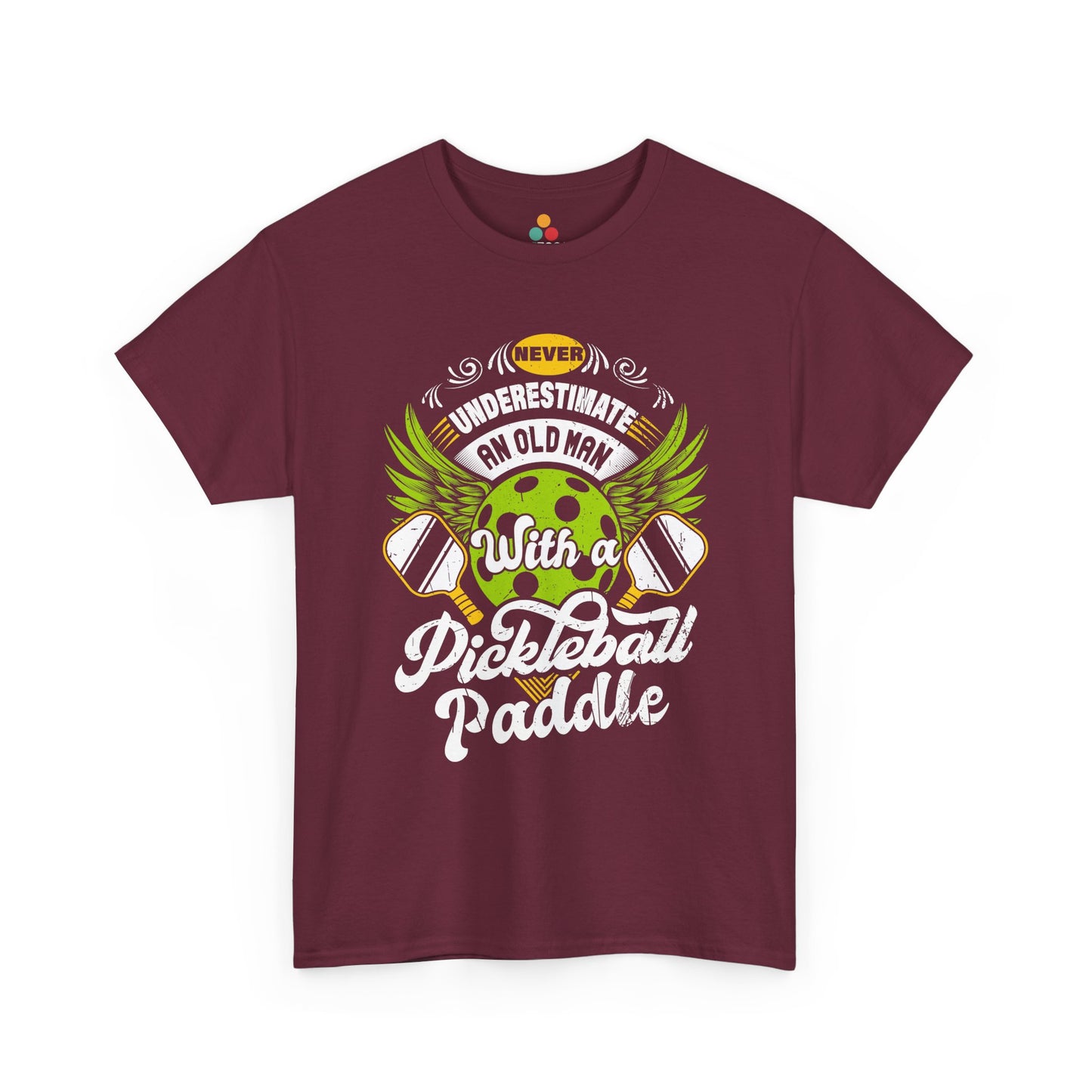 “Teezoca maroon Never Underestimate an Old Man with a Pickleball Paddle shirt, green pickleball with wings and paddles, funny gift for pickleball grandpa, front.”

