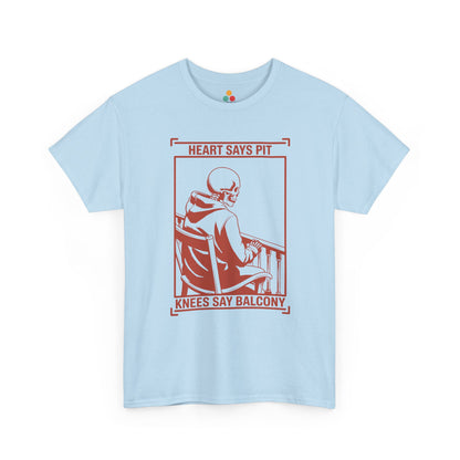 Light blue t-shirt mockup with “Heart Says Pit Knees Say Balcony” skeleton concert quote graphic on front.
