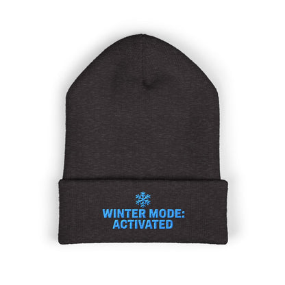Black beanie with 'Winter Mode: Activated' text on a white background. Cozy embroidered beanie featuring Winter Mode Activated design