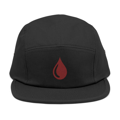 Black cap with a red droplet symbol on a white background. Minimal coffee drop icon embroidered in a clean, modern style 5-panel cap. TEEZOCA